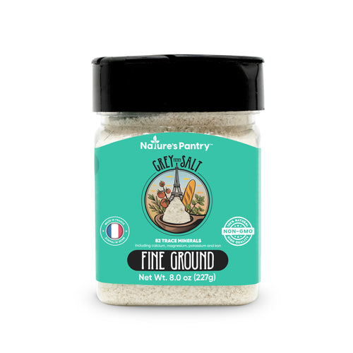 Shaker of Nature's Pantry French Grey Salt on a white background